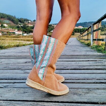 bota yute turquesa y plata